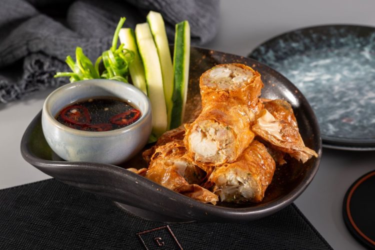 Cooling Tower Rooftop Bar Elevates Evenings with Crispy Crab Bean Curd Rolls - TOP25RESTAURANTS.com
