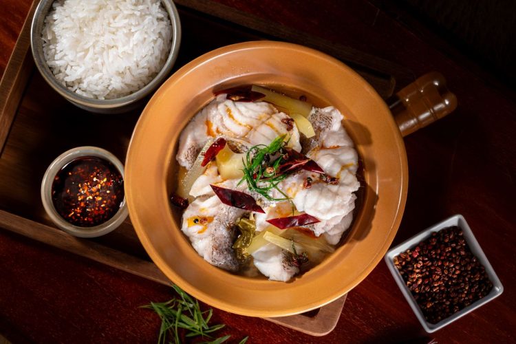 A Taste of Comfort: Braised Grouper with Mustard Greens in Clay Pot - TOP25RESTAURANTS.com